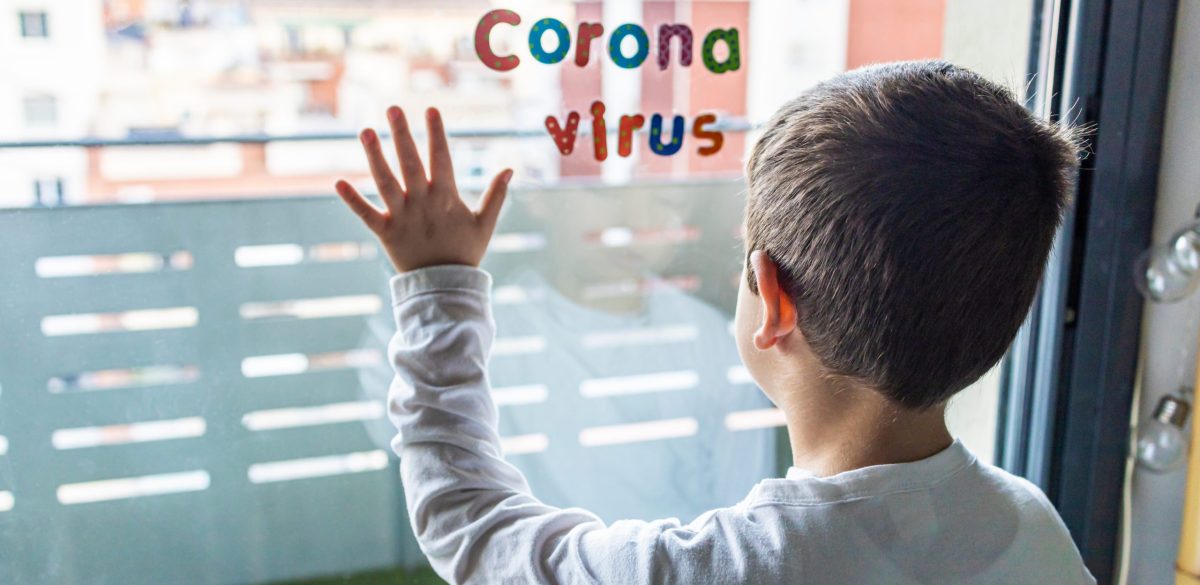 Little boy in confinement for the Coronavirus pandemic