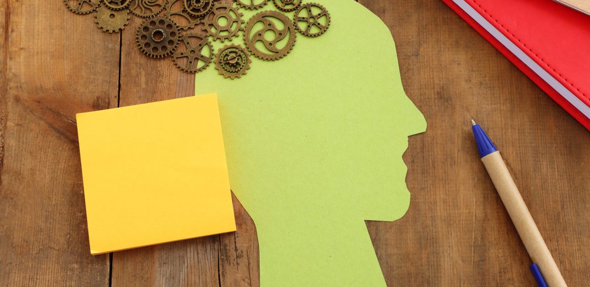 top view image of wooden table and person silhouette. concept of mental health and mind